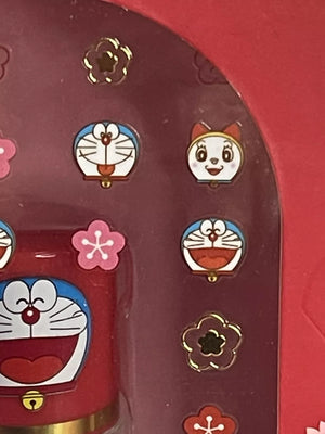 The Crème Shop x Doraemon Nail Kit – 50 Nail Decals + Clear Top Coat Polish